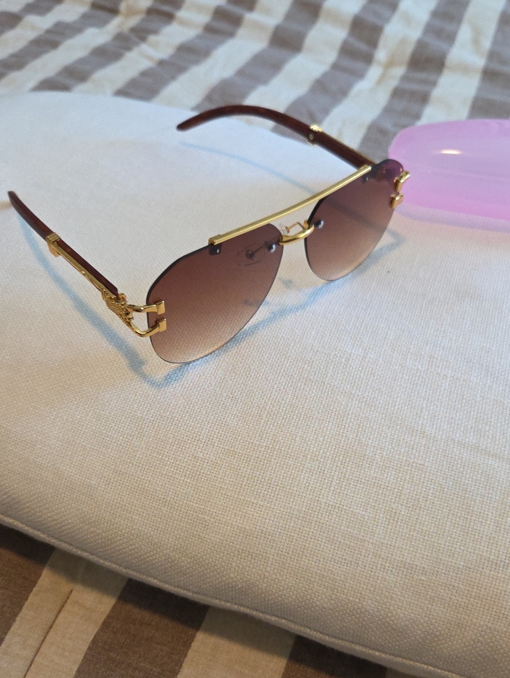 Rimless Aviator Sunglasses with Gold Accents and Brown Gradient Lenses